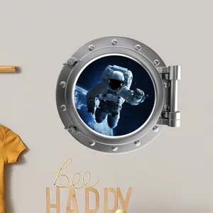 Luminous porthole wall sticker astronaut space design for kids room background decor.