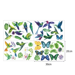 Vue détaillée des stickers muraux lumineux colibri papillon, décoration fluorescente.