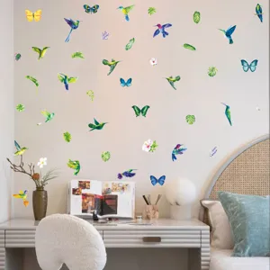 Stickers muraux fluorescents lumineux colibris papillons pour decor de chambre d'enfants.