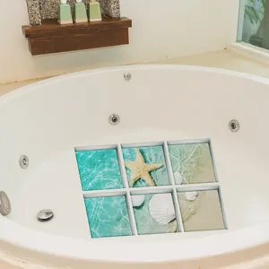 Ocean themed anti-slip bathtub sticker with starfish and seashell patterns for safety.