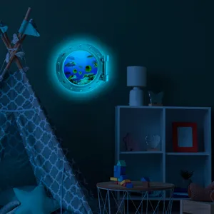 Glow in the dark porthole wall sticker featuring ocean animals for kids room decoration.