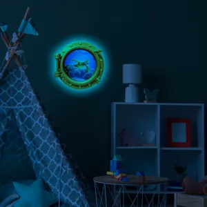 Glow in the dark porthole wall sticker featuring ocean turtle design for kids room detail