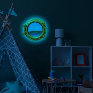 Detailed view of the luminous ocean porthole wall sticker glowing in dark children room decor.