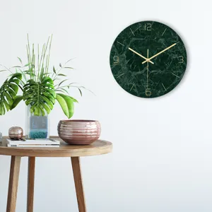 Modern green marble wall clock with gold hands and numbers for stylish living room decor.