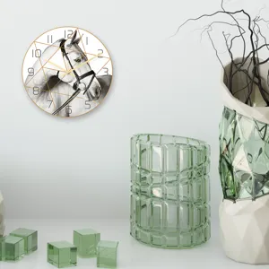 Modern minimalist acrylic wall clock with geometric horse head print for home decor.