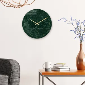Modern green marble wall clock with acrylic material and gold hands for living room decor.