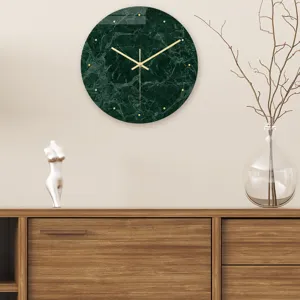 Modern minimalist green marble wall clock with luxury gold hands for living room decor.