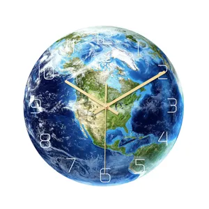 Modern minimalist acrylic earth wall clock with gold hands for living room and bedroom.