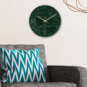Modern dark green marble wall clock detail shot, minimalist gold hands and sleek circular design.