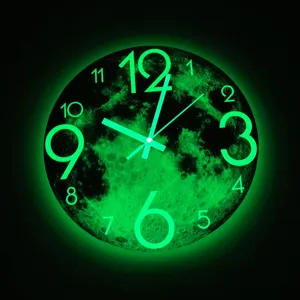 Luminous moon wall clock with glowing green numbers, silent movement for bedroom and living room.