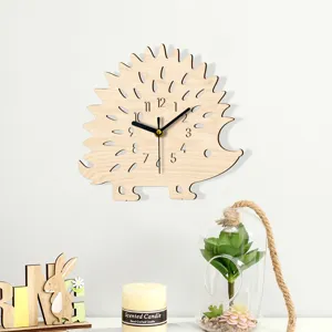 Wooden hedgehog wall clock detail featuring silent quartz movement and clear dial numbers.