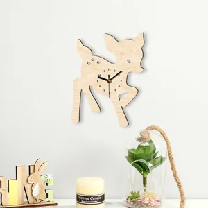 Wooden deer wall clock with silent sweep movement and clear dial for modern home decor.