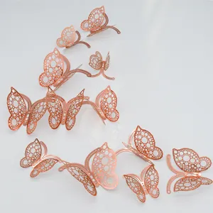 Close-up details of 3D metallic hollow butterfly wall stickers for home decoration
