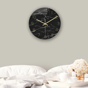 Detailed view of modern minimalist marble texture wall clock hanging in cozy bedroom setup.