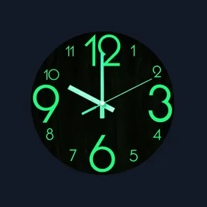 Glow in the dark wall clock with green numbers and silent movement for bedroom living room decor.