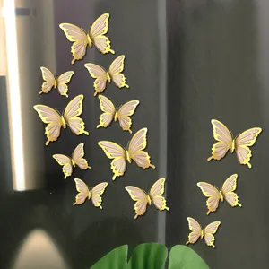 3D metallic hollow butterfly wall stickers detail view showing layered pink and gold design.