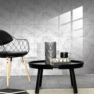 Detailed view of white marble pattern wall tile stickers in a modern interior setting.