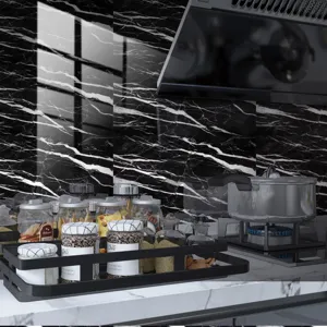 Detailed view of black marble pattern tile sticker with crystal texture in modern kitchen.