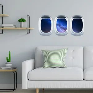 Autocollant mural fenetre avion lumineuse ciel etoile galaxie deco chambre d'enfant.
