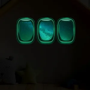 Autocollants muraux hublot d'avion lumineux phosphorescents ciel étoilé espace décor chambre enfant.