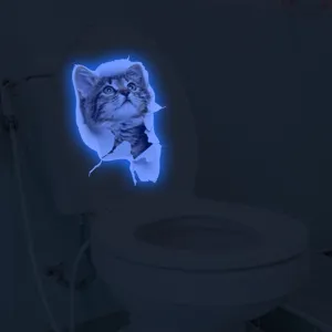Glow in the dark 3D cat toilet sticker detail shot showing luminous blue bathroom decor.