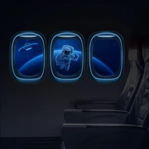 Sticker mural lumineux hublot d'avion avec astronaute de l'espace pour chambre d'enfant.