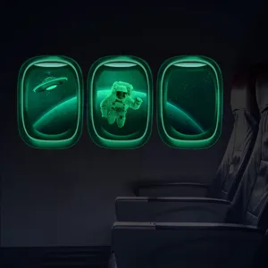 Stickers muraux phosphorescents motif hublot d'avion avec astronautes et ovnis pour chambre d'enfant.