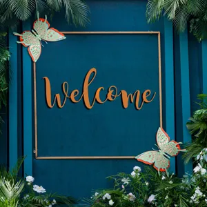 Detailed shot of 3D hollow butterfly wall stickers and welcome sign party decor set.
