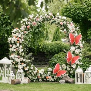 Exquisite details of 3D 4-layer hollow pearl paper butterflies for wedding party decor.