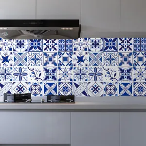 Detail view of blue and white retro mosaic tile stickers for kitchen wall decoration.