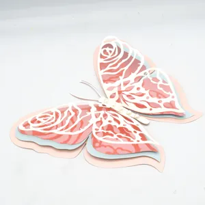Detailed shot of 3D multi-layer hollow pearl paper butterfly wall sticker craft decor.