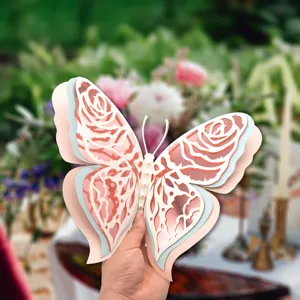 3D layered pearlescent paper butterfly wall sticker detail showcasing delicate hollow design.