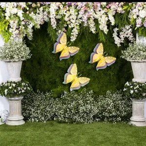 Detail view of 3D layered hollow pearl paper butterfly wall stickers for festive decor.