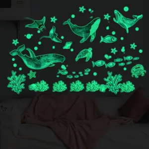 Glow in the dark marine animal wall stickers, featuring whales and turtles in dark room.
