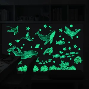 Detailed view of luminous ocean animal wall stickers, glowing whales and fish for kids room decor.