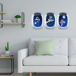 Sticker mural espace astronaute, design de hublot d'avion pour déco chambre enfant.