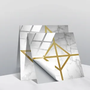 Marble pattern gold geometric tile sticker detail, modern peel and stick wall decor closeup.