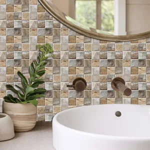 Detail view of self-adhesive mosaic tile sticker with stone texture in bathroom setting.