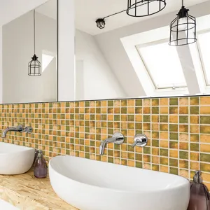 Close-up scene showcasing yellow and green mosaic tile stickers for stylish bathroom wall renovation.
