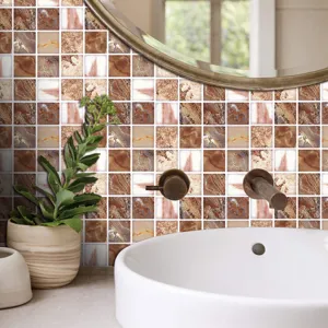Close-up detail of self-adhesive mosaic tile stickers installed in a modern bathroom.