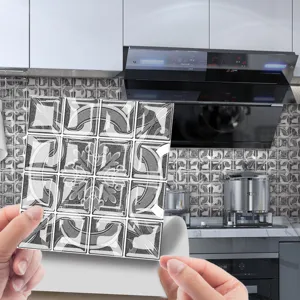 3D mosaic tile sticker detail showing textured self-adhesive surface in kitchen setting.