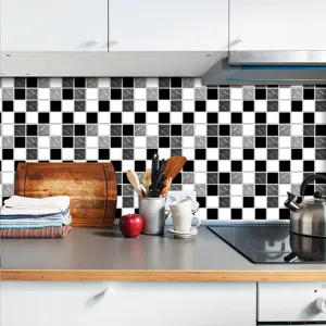 Adhésif carrelage 3D noir et blanc moderne pour dosseret de cuisine et détail de mur.