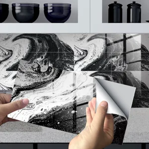 Close-up detail of black and white marble tile sticker showing peelable backing and glossy.