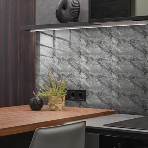 Detail shot of grey marble pattern wall tile sticker, waterproof crystal film for kitchen decor.