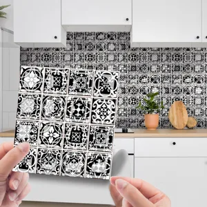 Detail view of black and white mosaic tile sticker, self-adhesive PVC wall decor for kitchen.