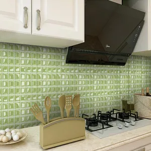 Self-adhesive 3D green mosaic tile stickers for kitchen wall DIY decoration and waterproof.
