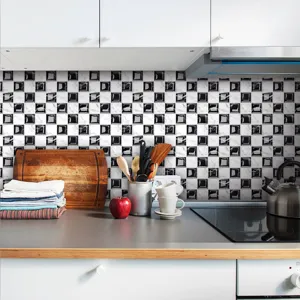Black and white 3D mosaic tile sticker, self-adhesive PVC wall decor for kitchen detail.