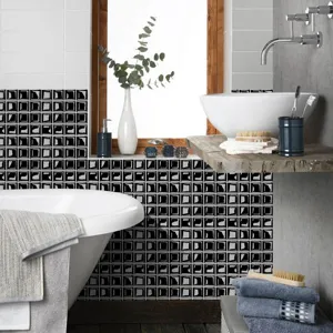 Modern black and white 3D mosaic tile stickers, self-adhesive waterproof PVC wall decor.