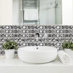 Bathroom tile sticker detail showing waterproof self-adhesive black white mosaic wall decor.