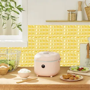 Detailed view of the 3D yellow mosaic tile sticker, self-adhesive PVC wall decor for kitchen.